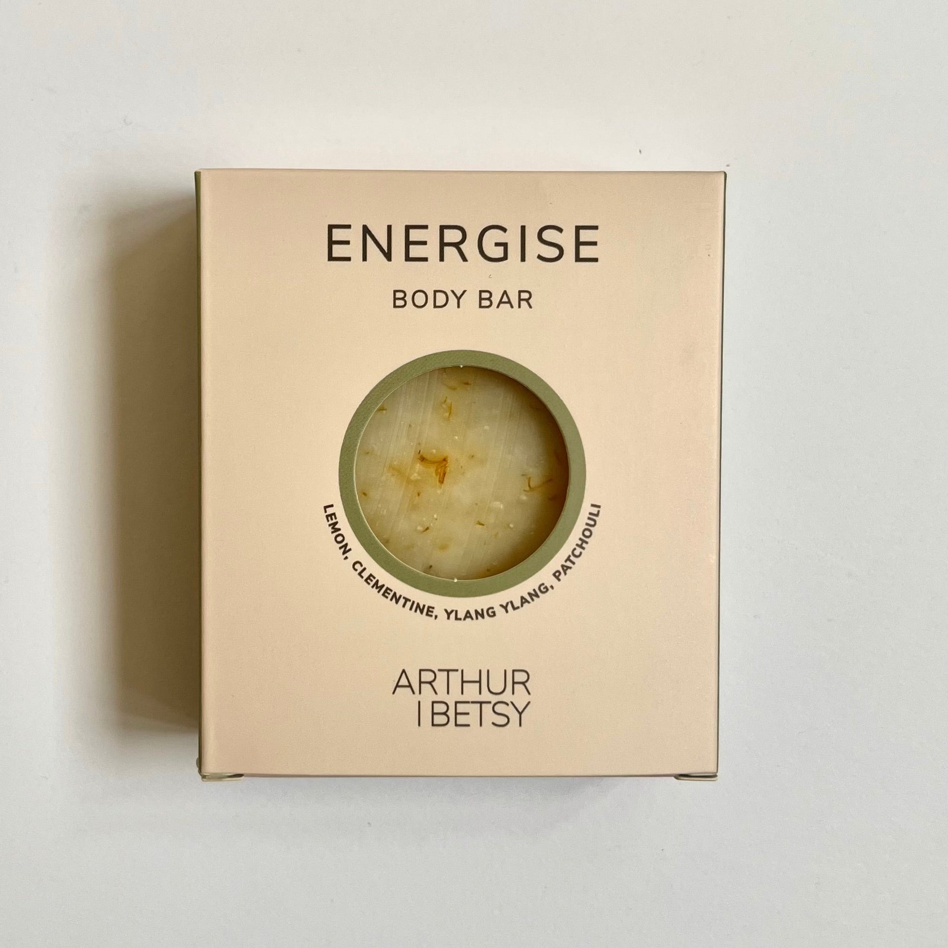Image of energise aromatherapy luxury soap bar shown as a flat lay with the beige soap in a beige cardboard box