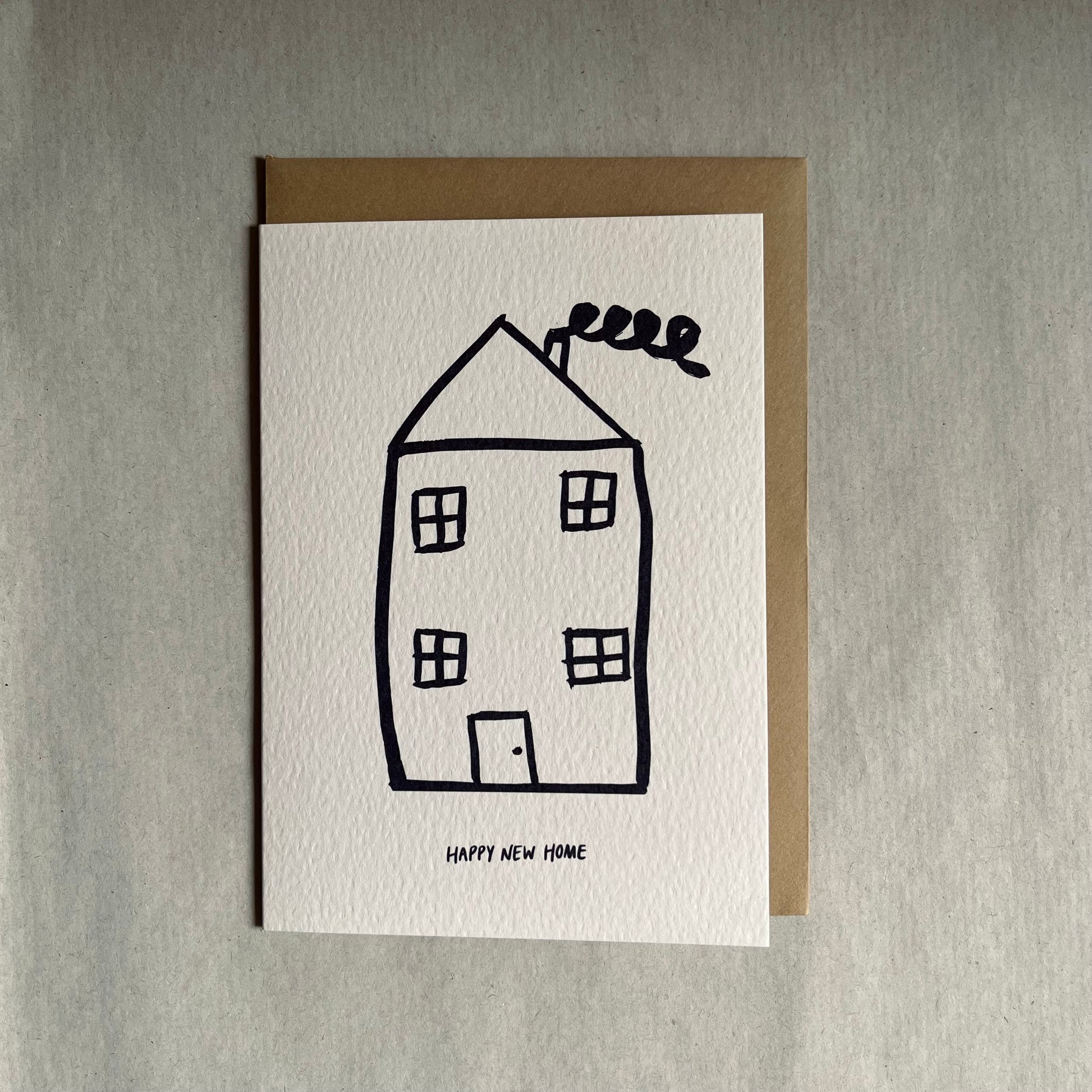 Happy new home / new house greeting card with a house illustration and 'Happy New Home' text