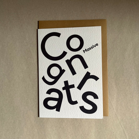 Congratulations card with 'Congrats' text on a beige background