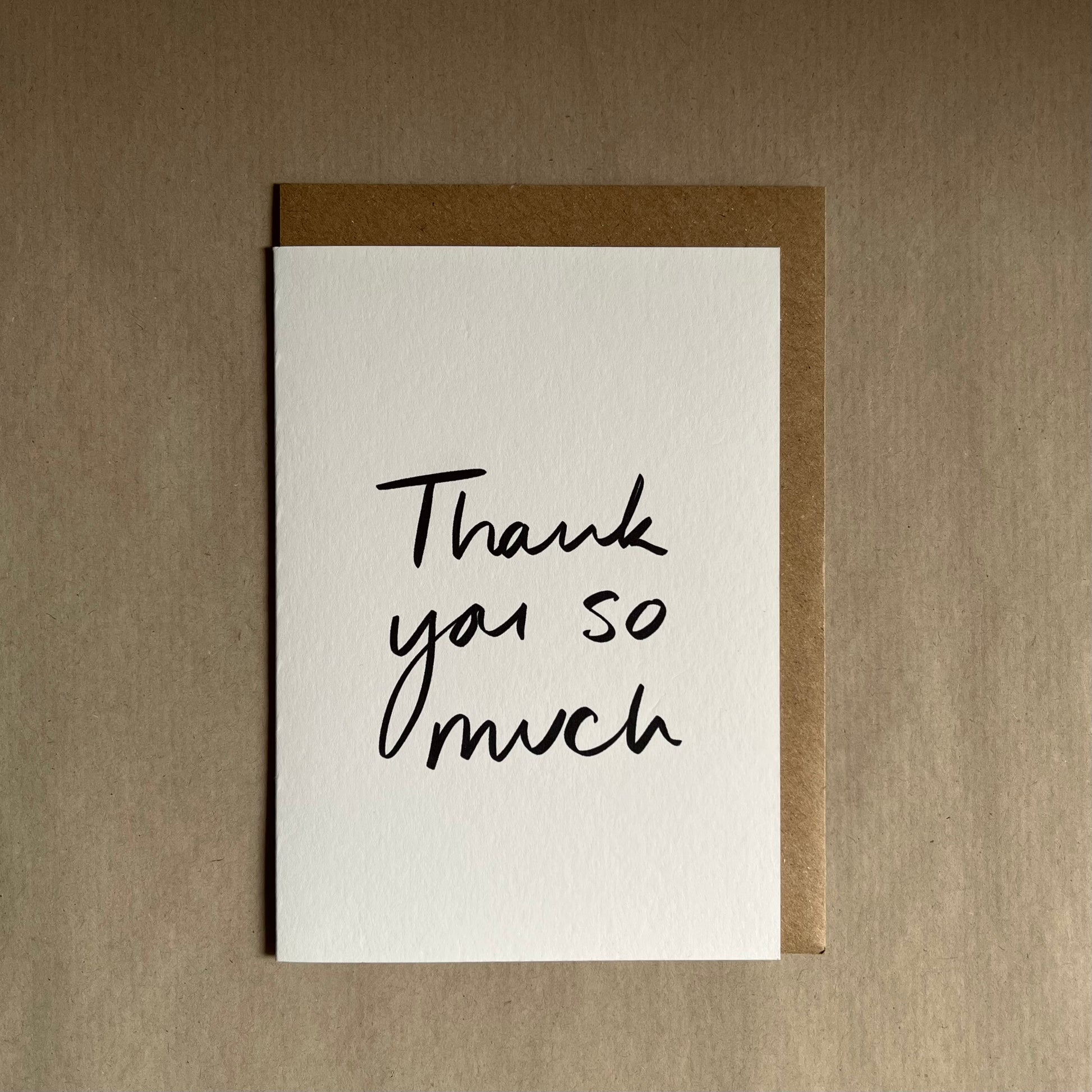 Thank you greeting card with 'Thank you so much' text on a beige background
