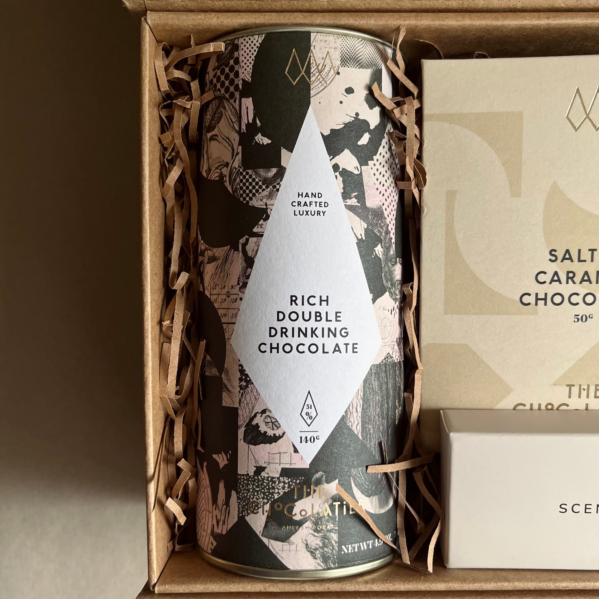 Close up image of rich double drinking chocolate in a decorative box included in the A Hug in a Box luxury gift box.