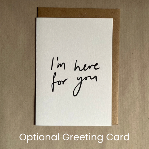 The Here for You Thinking of You letterbox gift box close up of optional greeting card with handwritten styled text saying “I’m here for you”