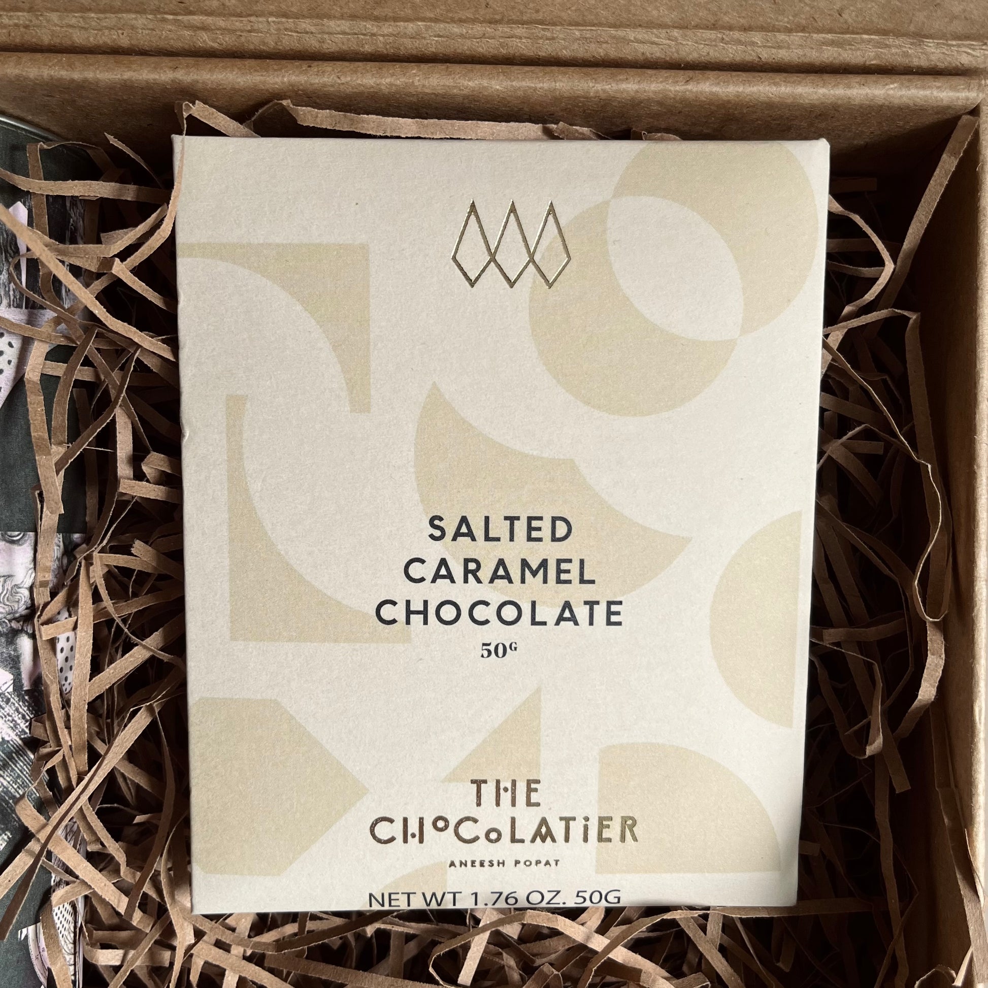 Close up image of salted caramel chocolate bar included in The Comfort Edit Thinking of You Gift Box 