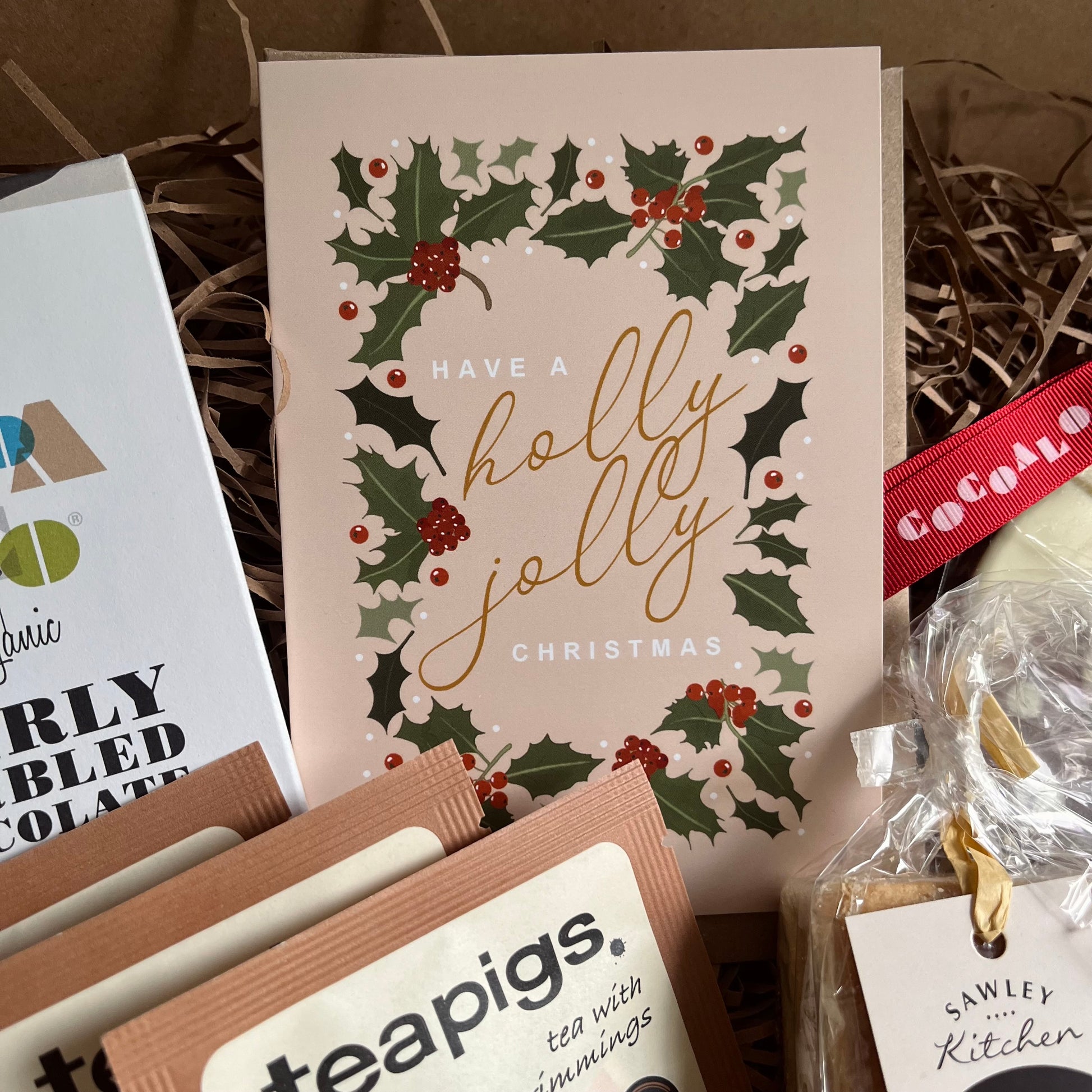 Holly jolly Christmas greeting card from the Festive Indulgence Gift Box.